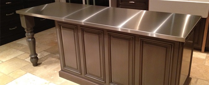Stainless Steel Countertop on Brown Center Island